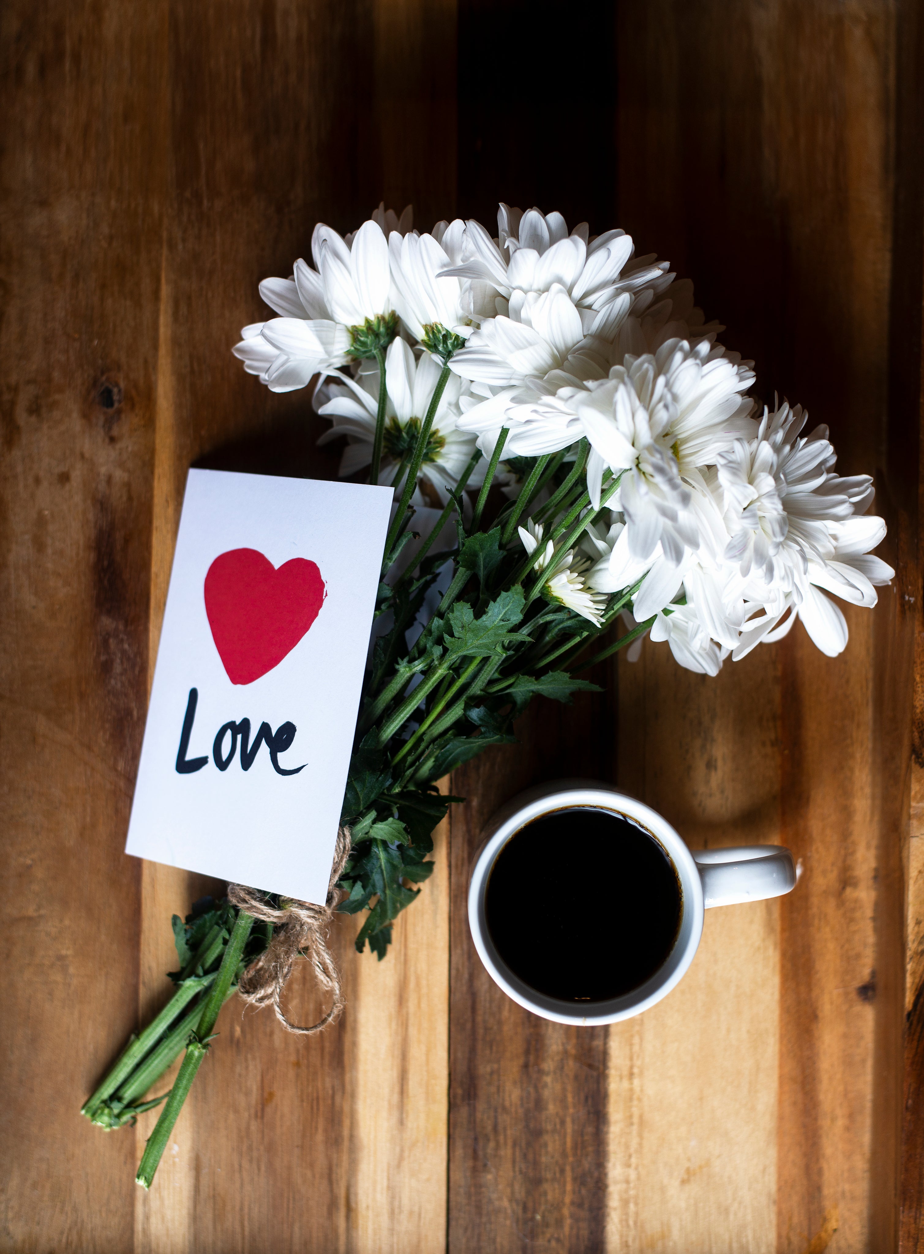 cup of coffee and flowers