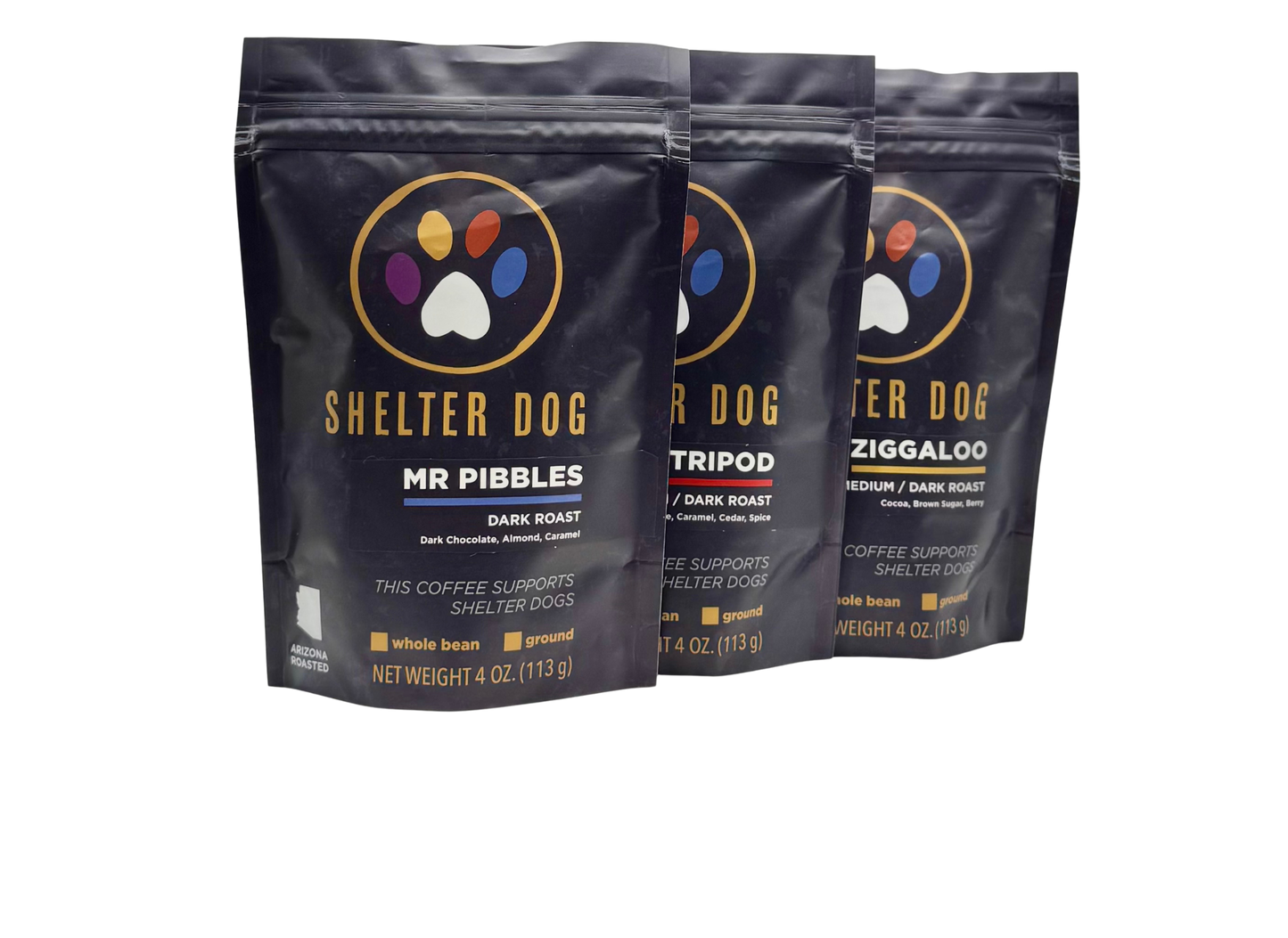Three black coffee bags with 'Shelter Dog' branding on a white background