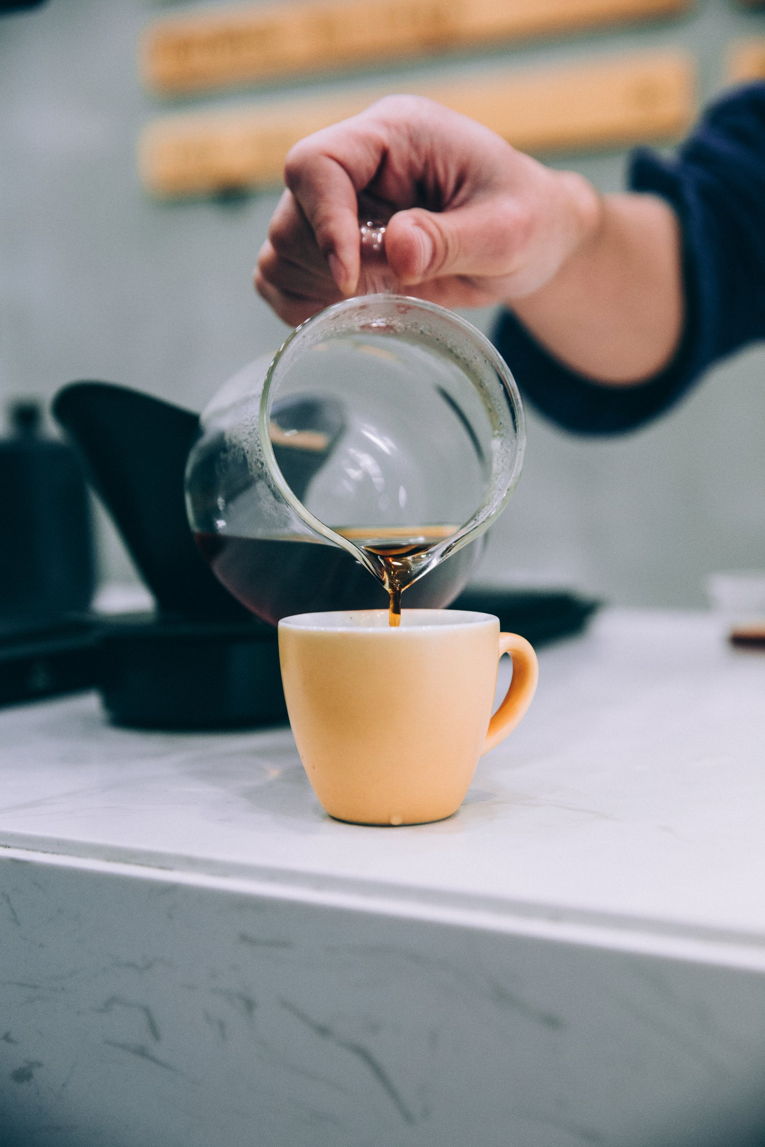 coffee being poured into cup